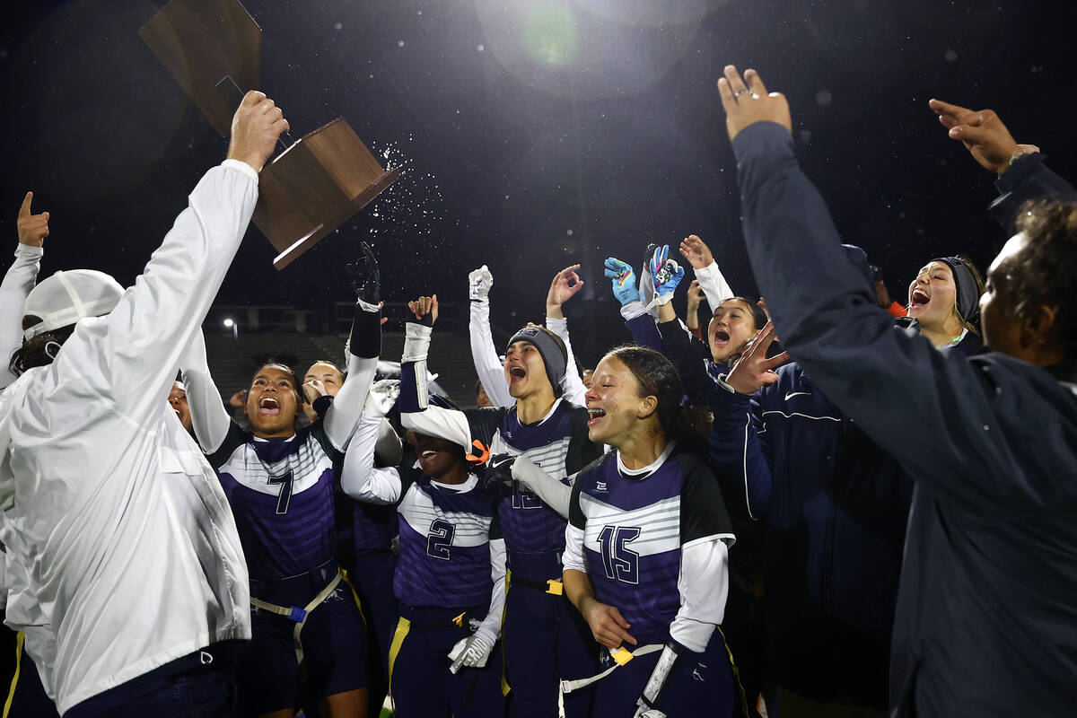 Shadow Ridge celebrates after winning the Class 5A flag football state championship game agains ...