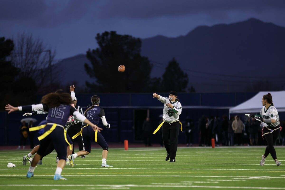 Palo Verde's Jordan Katz (6) passes against Shadow Ridge under stormy skies during the second h ...