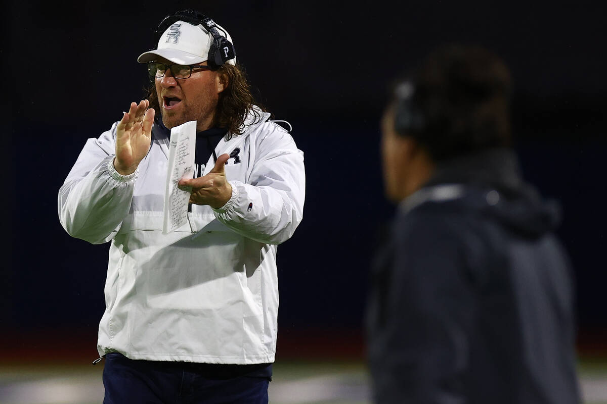 Shadow Ridge head coach Matthew Nighswonger cheers for his team during the second half of a Cla ...