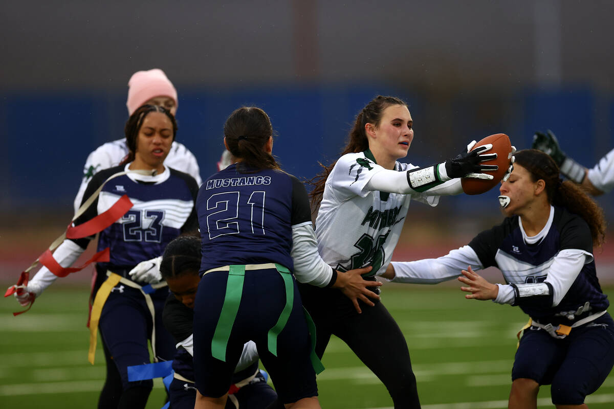 Palo Verde's Tia Brown (35) fights through Shadow Ridge’s defense during the first half ...