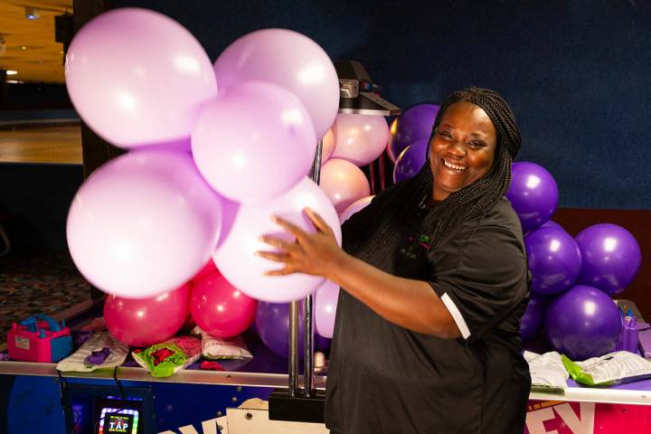 Las Vegas entrepreneur Jessica Washington, who owns Las Vegas Balloons, poses for a portrait wh ...