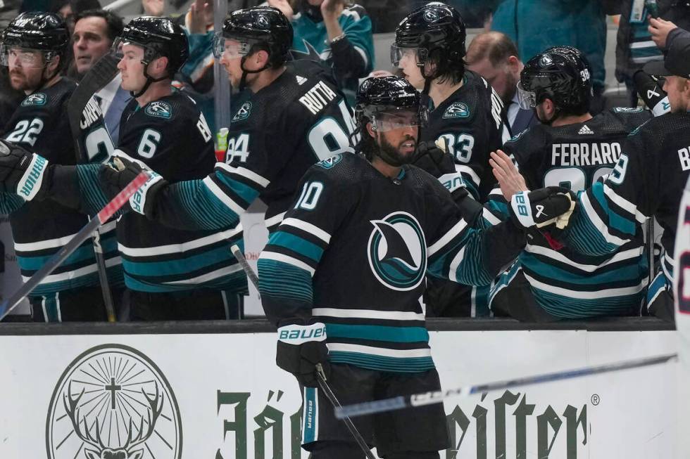 San Jose Sharks left wing Anthony Duclair (10) is congratulated by teammates after his goal aga ...