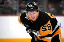 Pittsburgh Penguins' Jake Guentzel prepares for a face-off during the second period of an NHL h ...