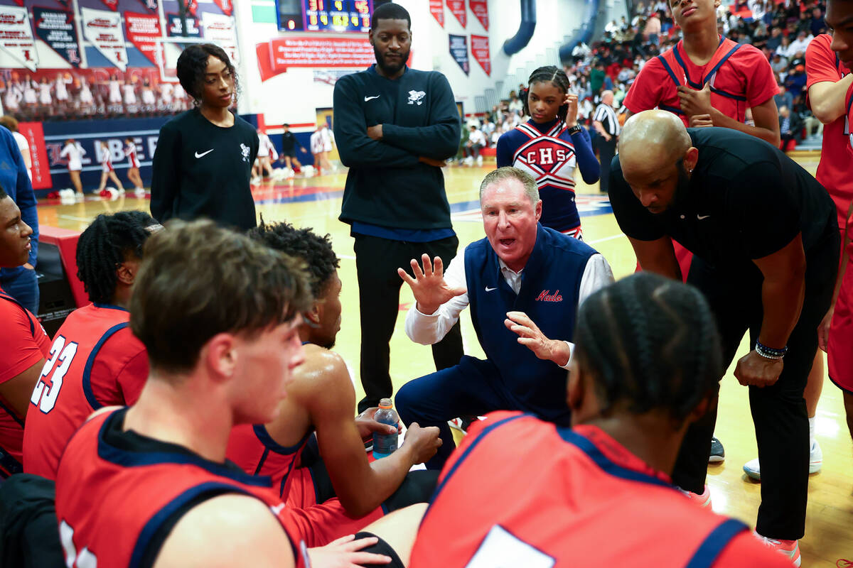 Coronado head coach Jeff Kaufman commands a timeout during the second half of a high school bas ...