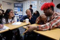 Mike Rowe of “Dirty Jobs” talks with students Yalitzi Muro, 14, left, and Lyric Rojas, 16, ...