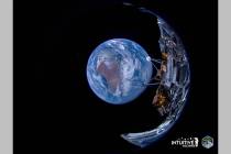 This image provided by Intuitive Machines shows its Odysseus lunar lander with the Earth in the ...