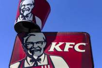 A KFC fast-food restaurant sign on Sahara Avenue is shown, on Wednesday, April 26, 2023, in La ...