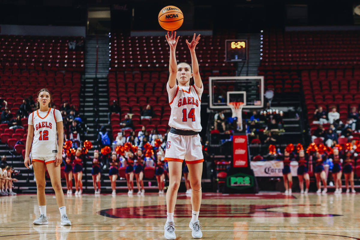 Bishop Gorman point guard Kenzee Holton (14) makes a free throw during a Class 5A girls basketb ...