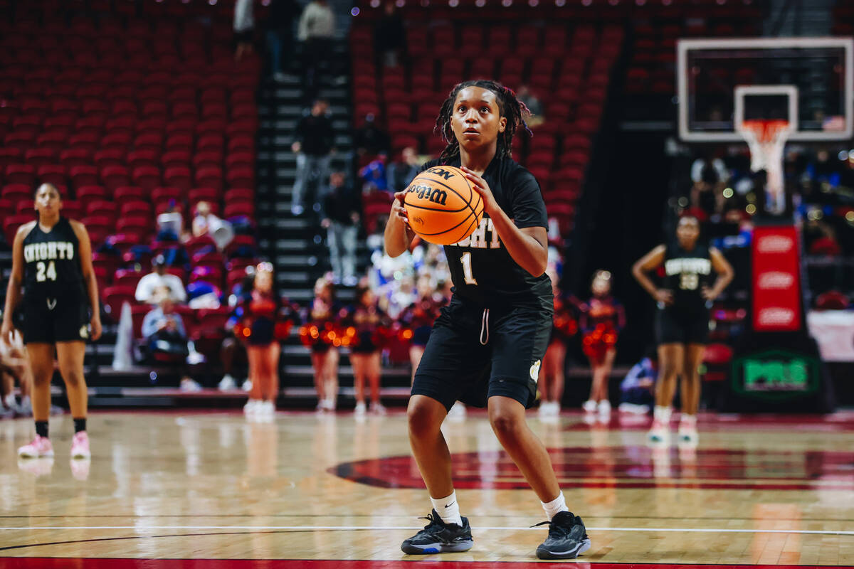 Democracy Prep guard Mikiah Verdum (1) makes a free throw during a Class 5A girls basketball st ...