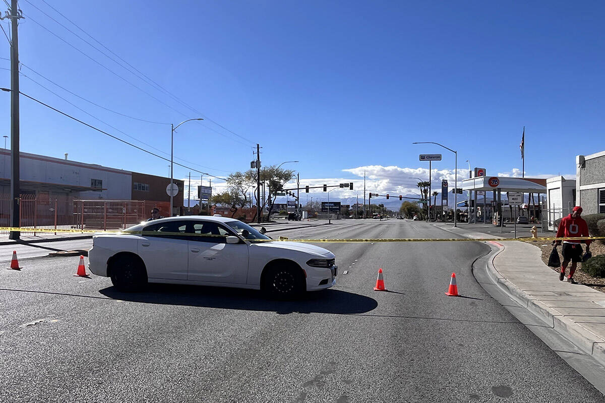 Police investigate a shooting Thursday, Feb. 22, 2024, at the intersection of North Martin Luth ...