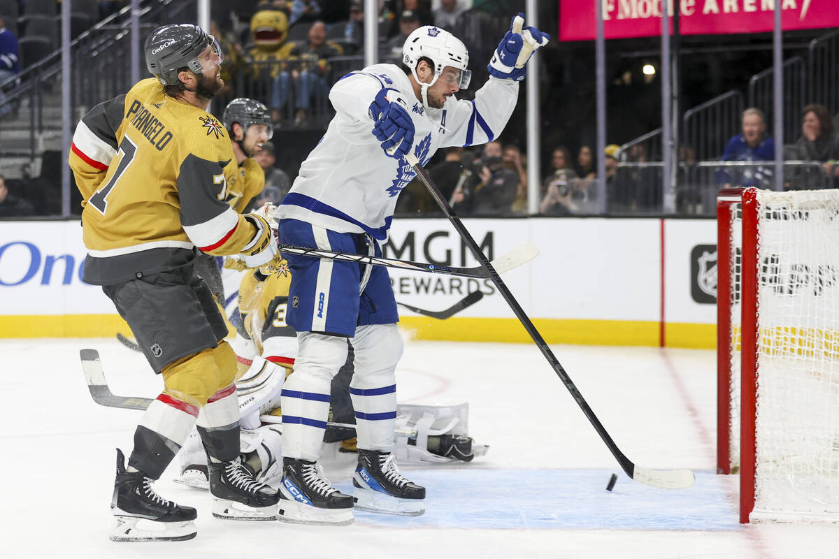 Vegas Golden Knights defenseman Alex Pietrangelo (7) reacts while Toronto Maple Leafs center Au ...