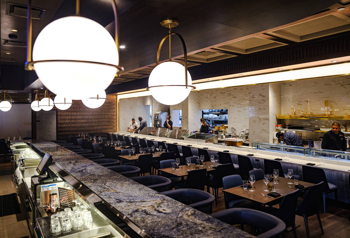 The dining room and kitchen at Emmitt’s, located at the Fashion Show mall in Las Vegas, Mond ...
