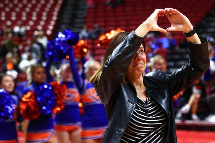 Bishop Gorman head coach Sheryl Krmpotich gestures to the fan section after her team won the Cl ...