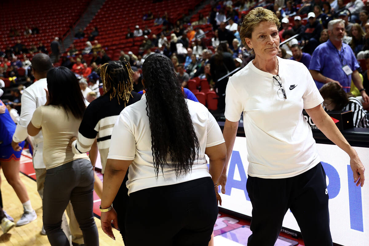 Centennial head coach Karen Weitz walks through the handshake line after her team lost the Clas ...