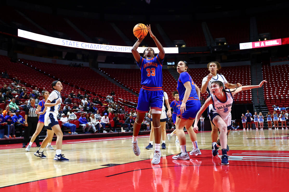 Bishop Gorman's Neeyah Webster (33) shoots against Centennial during the second half of the Cla ...