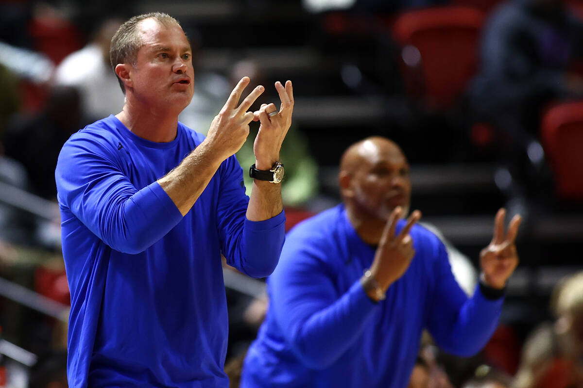 Bishop Gorman head coach Grant Rice calls plays from the sidelines during the first half of the ...