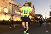 Travis Dowell competes in the Rock ‘n’ Roll Running Series Las Vegas half-marathon in 2023 ...