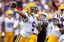 FILE - LSU quarterback Jayden Daniels (5) throws the ball against Mississippi State during the ...