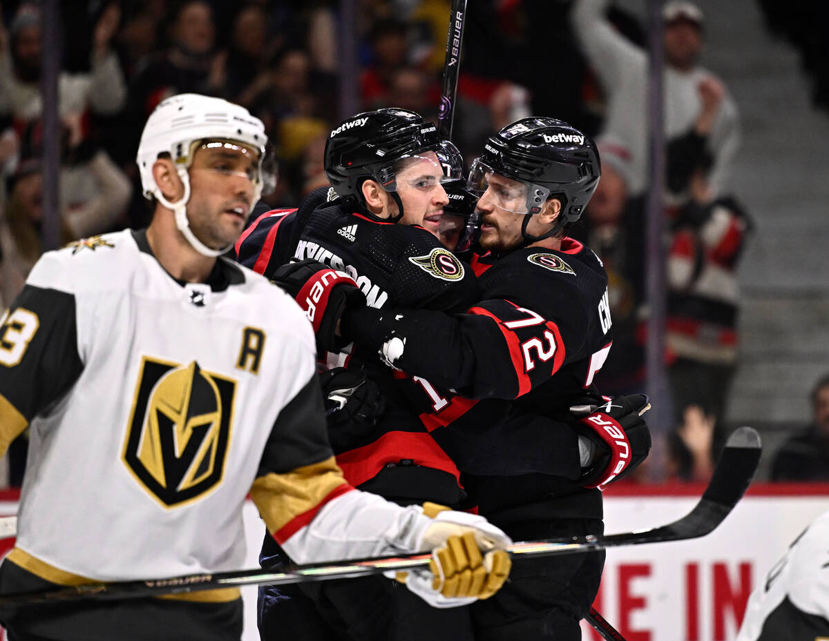 Ottawa Senators right wing Drake Batherson, center, celebrates his goal against the Vegas Golde ...