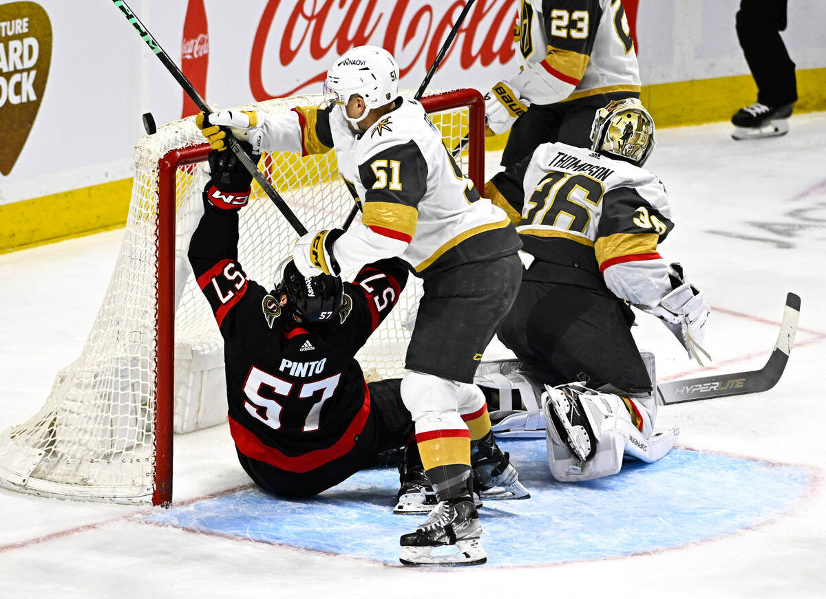 Vegas Golden Knights centre Byron Froese (51) bats the puck down with his stick as Ottawa Senat ...