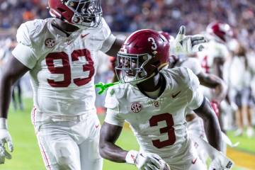 Alabama defensive back Terrion Arnold (3) celebrates after an interception on an NCAA college f ...