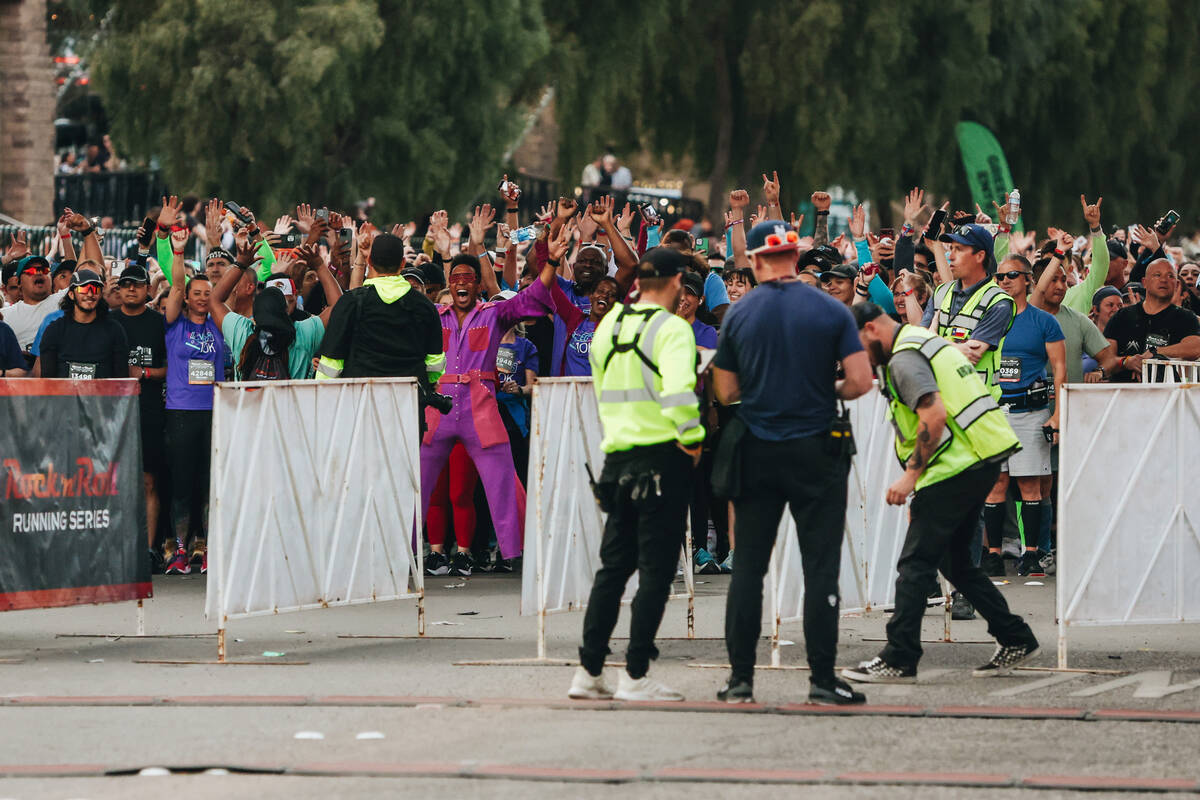 Runners get excited to cross the starting line during the Rock ’n’ Roll Running S ...