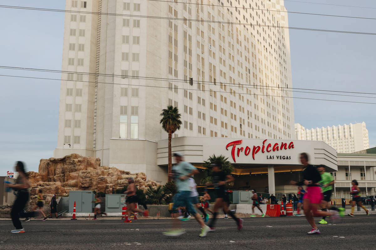 Runners run by the Tropicana during the Rock ’n’ Roll Running Series on Las Vegas ...