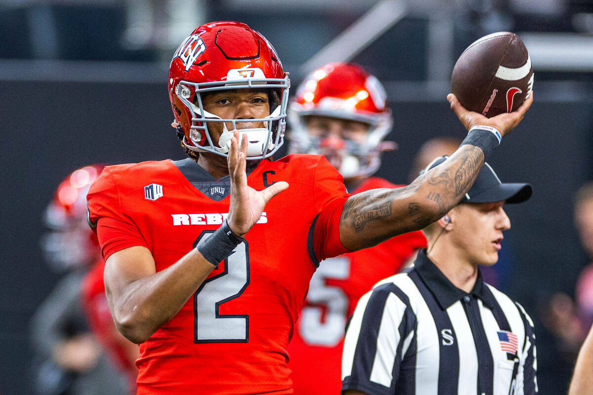 UNLV quarterback Doug Brumfield (2) tosses a pass in warmups before the first half of their NCA ...