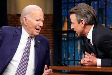 President Joe Biden talks with Seth Meyers during a taping of the "Late Night with Seth Me ...