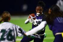 Shadow Ridge's Kyla Moore (3) runs the ball up the field during the second half of a Class 5A f ...