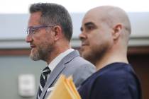 Attorney Robert Draskovich, left, addresses the court next to his client Robert Telles, right, ...