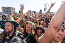 Attendees enjoy listening to Turnstile as they perform during the Sick New World festival at th ...