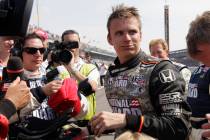 FILE - Dan Wheldon speaks with reporters after finishing in second place in the Indianapolis 50 ...