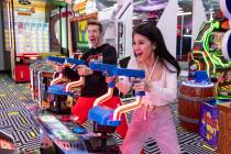 Chad Wild Clay and Vy Qwaint play in the skill-based arcade at the Spy Ninjas HQ theme park on ...