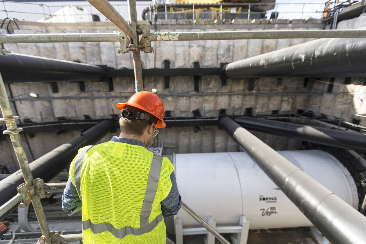 Media get a first glimpse at a tunnel boring machine east of the South Hall at the Las Vegas Co ...