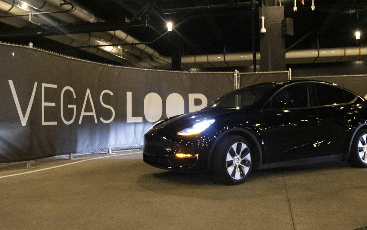 A Vegas Loop Tesla departs from the Boring tunnel passenger station at Resorts World Las Vegas ...