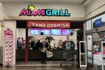 The entrance to Miami Grill, which opened in December 2023 in a Walmart in Henderson. Pitbull, ...