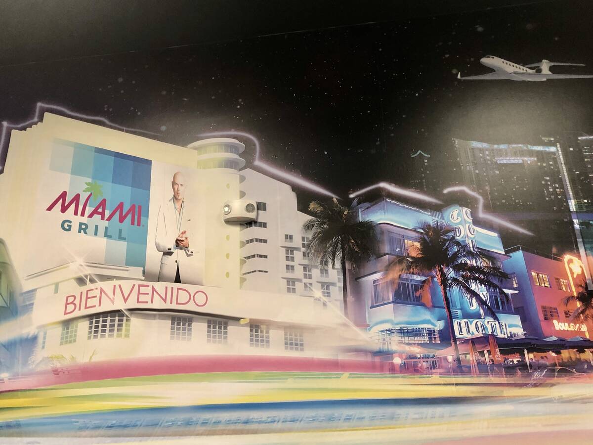 One half of a mural depicting Miami highlights at Miami Grill, which opened in December 2023 in ...