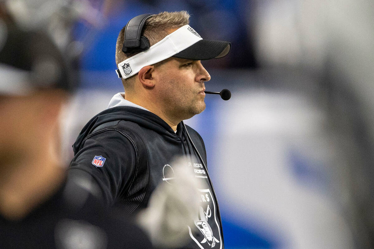 Raiders head coach Josh McDaniels watches the game against the Detroit Lions during the second ...