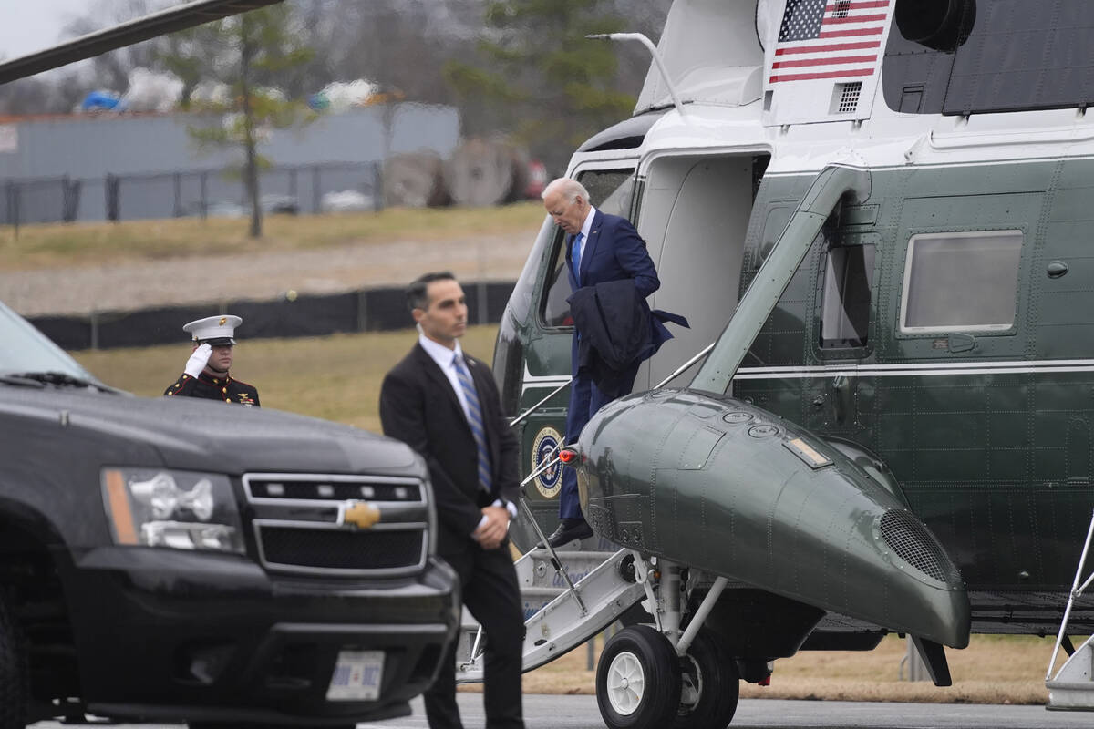 President Joe Biden arrives at Walter Reed National Military Medical Center for a physical, Wed ...