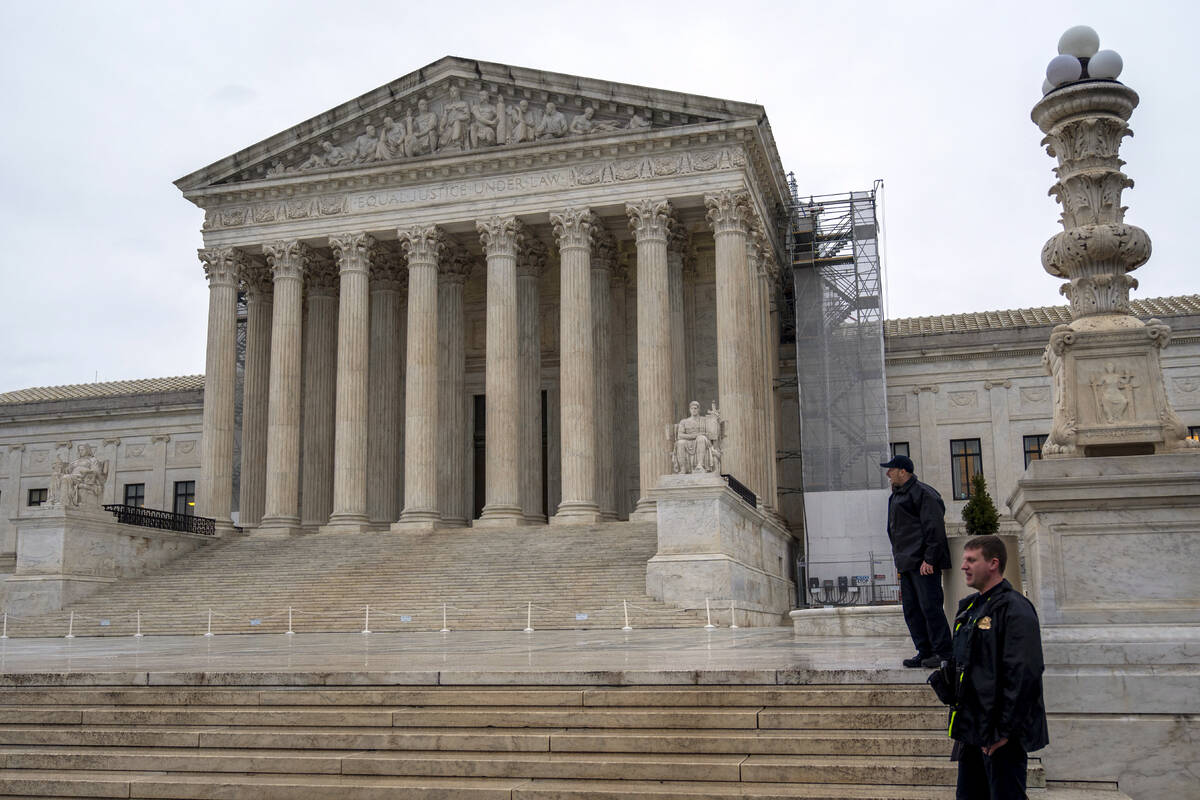 U.S. Supreme Court Police work in front of the Supreme Court, Wednesday, Feb. 28, 2024 in Washi ...