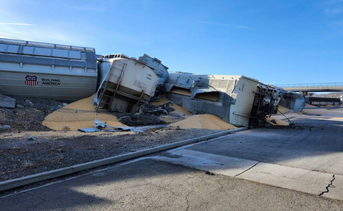 This photo shows some of 16 grain hoppers of a Union Pacific freight train that derailed Wednes ...