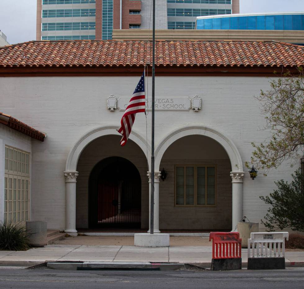 The U.S. flag is flown at half-staff at the Historic Fifth Street School in memory of former U. ...