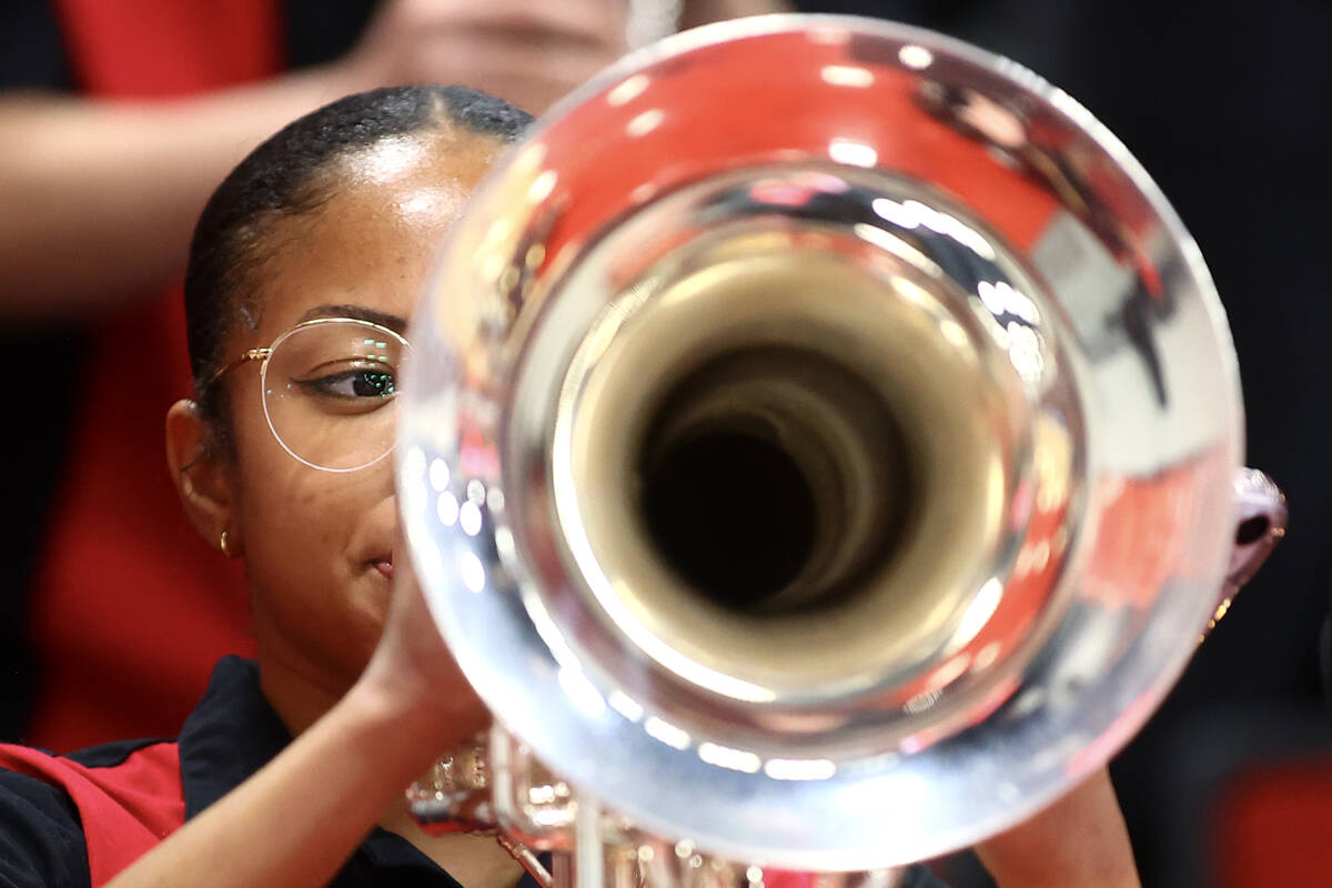 The UNLV band plays during the second half of an NCAA college basketball game between the UNLV ...