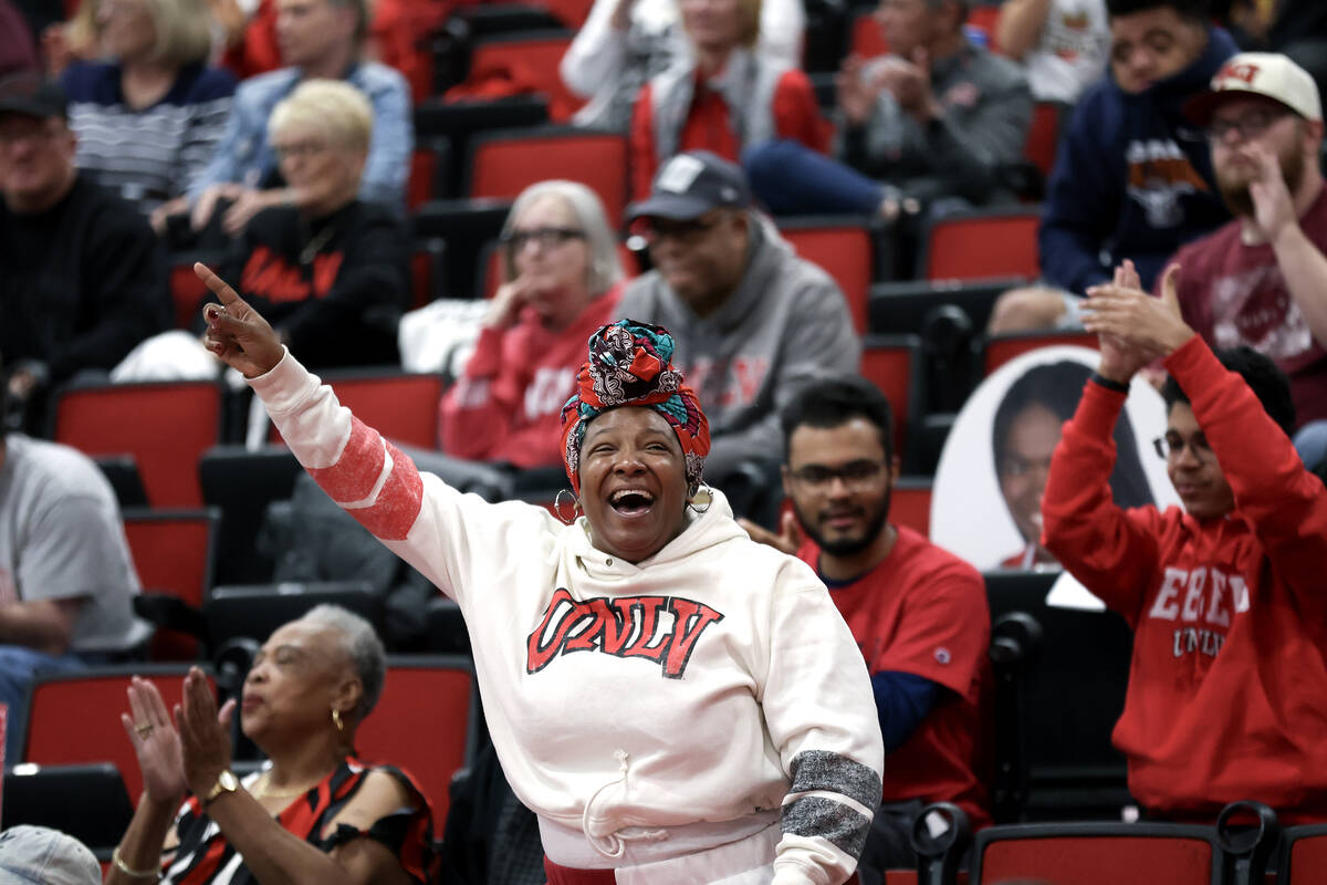 A UNLV Lady Rebels fan cheers during the second half of an NCAA college basketball game against ...