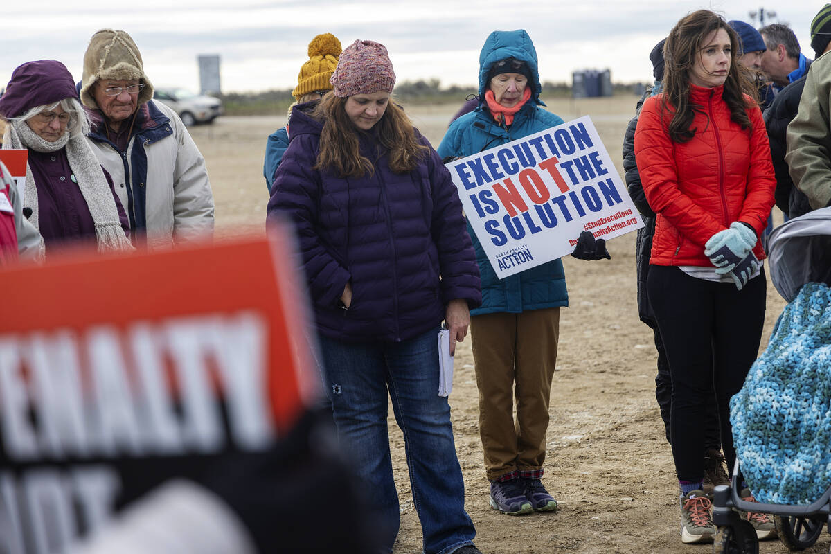 Protesters gather outside of the Idaho State prison complex near Kuna, Idaho, to protest the de ...