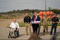 Republican presidential candidate former President Donald Trump speaks as Texas Gov. Greg Abbot ...