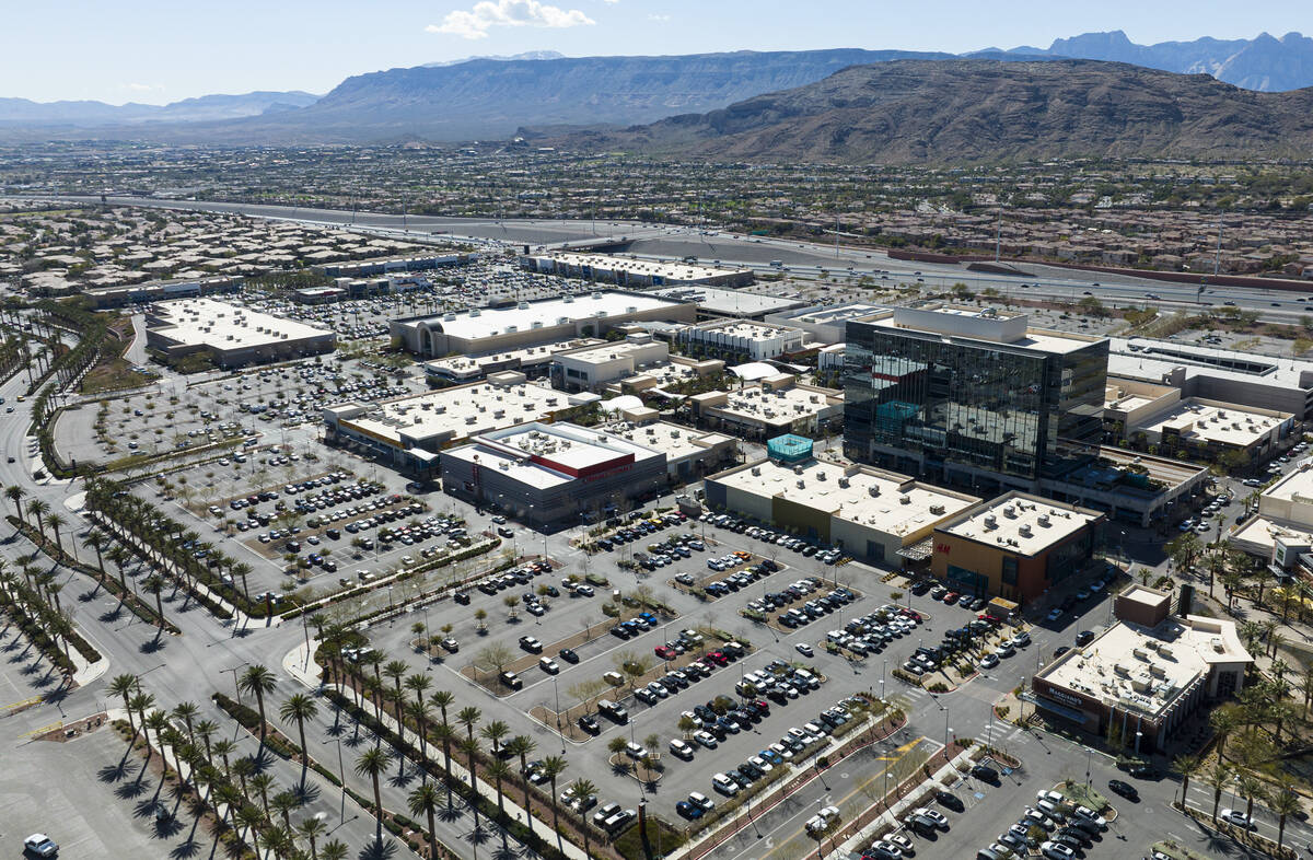 An aerial view of One Summerlin, a 9-story office building, right, and downtown Summerlin, on T ...