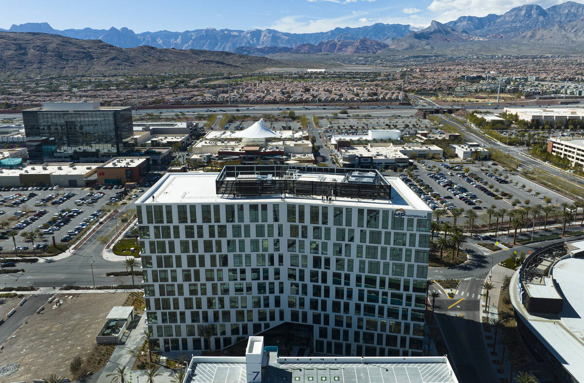 An aerial view of 1700 Pavilion, front, a 10-story office building, and One Summerlin, a 9-stor ...