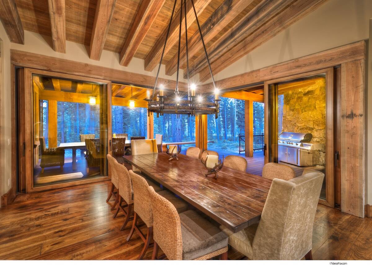The dining room features interior beams that are trestle wood reclaimed timbers, stressed hicko ...